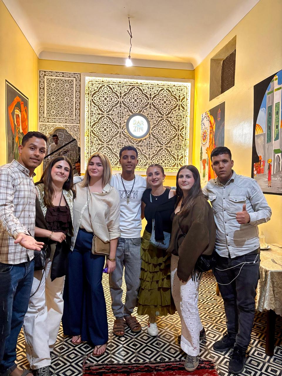 Traditional Moroccan tagine and mint tea in authentic setting